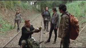 Us- Abraham offers Glenn supplies before he and Tara enter tunnel