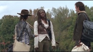 Us- Michonne owes Carl some chocolate