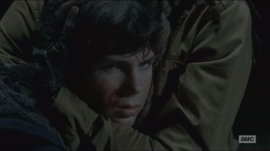 A- Carl watches his father murder a man