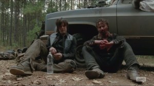 A- Daryl and Rick talk after marauders attack