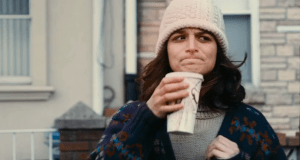 Obvious Child- Teary-eyed Donna stands outside Ryan's house