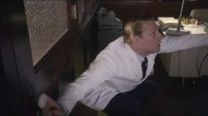 Parallax- Langham rushes into DePaul's office to hide from his wife