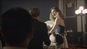 Asterion- Holly pops out of a birthday cake for Austin