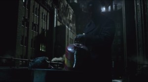 Arkham- Richard Gladwell preparing to burn Councilman Zeller, played by John D. Haggerty