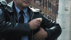 The Balloonman- Officer pocketing money