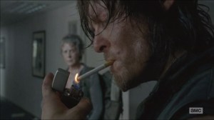 Consumed- Daryl lights up while Noah remains pinned under the bookshelf