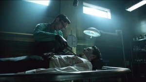 The Mask- Nygma examines body