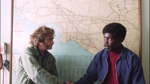 Inherent Vice- Doc meets with Tariq Kahlil, played by Michael Kenneth Williams, who tells him about Glen Charlock