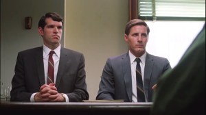Inherent Vice- Doc speaks with two agents, Agent Borderline, played by Timothy Simons, and Agent Flatweed, played by Sam Jaeger