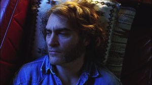 Inherent Vice- Larry ‘Doc’ Sportello, played by Joaquin Phoenix, sits in his beach home