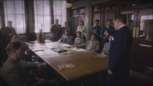 Now is Not the End- Chief Roger Dooley, played by Shea Whigham, briefs the team on Howard Stark