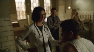 Rogues Gallery- Dr. Thompkins examines Royston