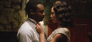 Selma- Coretta Scott King, played by Carmen Ejogo, helps her husband, Martin, played by David Oyelowo, with his tie