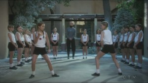 The Iron Ceiling- Young Dottie, played by Veronika Bonell, fights another girl