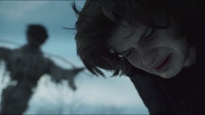 The Scarecrow- Jonathan Crane near a scarecrow