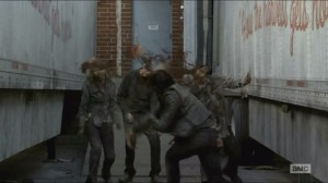 Conquer- Daryl mows down walkers with a chain