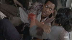 Spend- Glenn holds on as the walkers take Noah