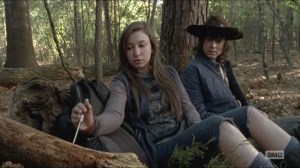 Try- Enid uses her mother's knife to carve into a log