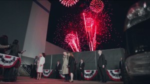 Data- Fireworks go off while Selina addresses the press