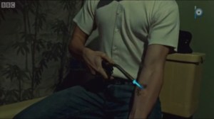 Transitory Sacrifices of Crisis- Mark burns off his tattoo