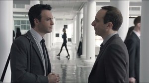 Tehran- Sidney Purcell, played by Peter Grosz, shows Dan around PKM offices