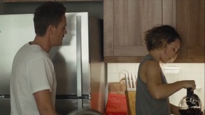 The Western Book of the Dead- Ani Bezzerides, played by Rachel McAdams, makes coffee while Steve, played by Riley Smith, tries to talk