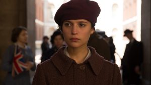 Testament of Youth- Vera Brittain, played by Alicia Vikander, walks through the crowd on Armistice Day