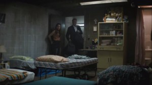 Omega Station- Felicia helps Frank into a hidden section of the bar