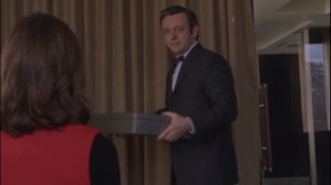 Under Influence- Bill's awkward smile as he gives Virginia a fur coat