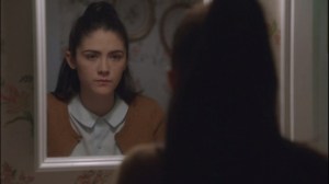 Under Influence- Tessa observes herself in the mirror