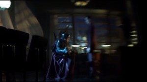 Damned If You Do- Man accepts a mysterious drink from a mysterious figure