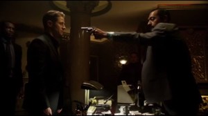 Damned If You Do- Ogden Barker, played by Otto Sanchez, points a gun at Gordon