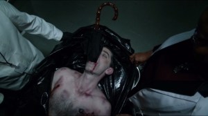 Worse Than a Crime- Galavan with Penguin's umbrella in his mouth