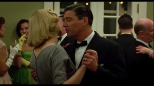 Carol- Carol and her husband, Harge, played by Kyle Chandler, dance at the party