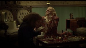 Carol- Therese and Carol laugh while having some drinks