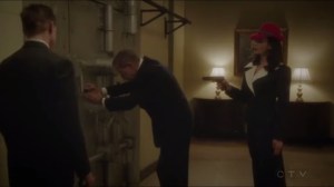 The Lady in the Lake- Dottie and a goon order bank employee, played by John Gilbert, to open the vault