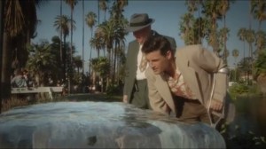 The Lady in the Lake- Sousa and Homicide Detective Andrew Henry, played by Sean O'Bryan, observe a woman frozen in a block of ice