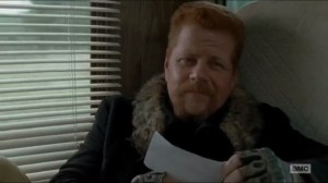 Knots Untie- Abraham looks at the sonogram photo