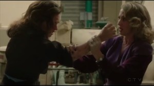 The Atomic Job- Whitney grabs Peggy's arm