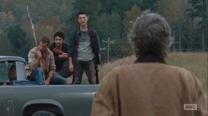 East- A group of Saviors confront Carol