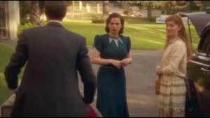 Hollywood Ending- Edwin happily gets Peggy's bags as he prepares to drive her