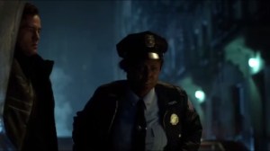 Mr. Freeze- Victor Fries, played by Nathan Darrow, shows an officer his trunk