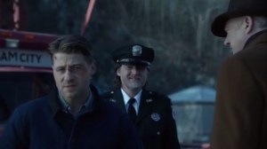 Prisoners- Jim, Falcone, and Bullock on a bridge