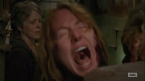 The Same Boat- Paula bitten by walker while Carol watches