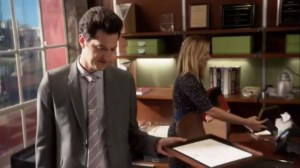 Holacracy- Clyde packs up his things as Jeannie claims her office