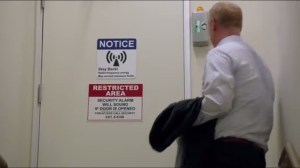 Morning After- Mike about to open an emergency door