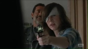 service-carl-holds-a-gun-to-some-saviors-as-negan-enters