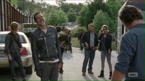 service-rick-hands-michonnes-rifle-over-to-negan