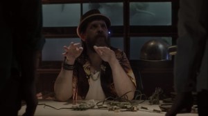 eMergence- Wire, played by Brad Carter, speaks with Marcos and Caitlin