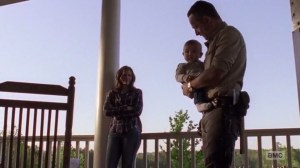 A New Beginning- Maggie watches as Rick holds baby Hershel- The Walking Dead